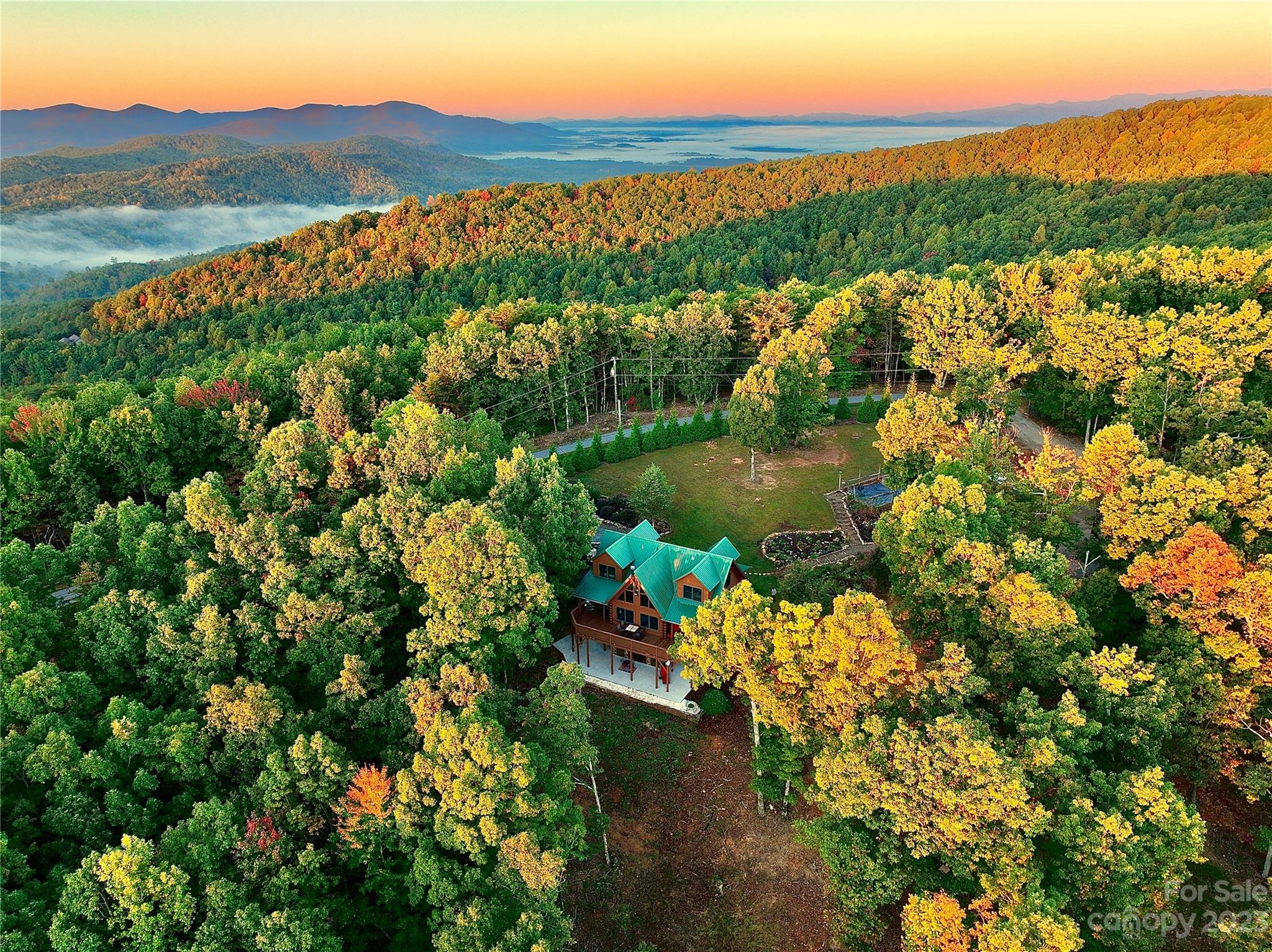 3703 Back Bluff Drive Morganton, NC 28655 - Photo 4 of 48 a view of a lake with a city