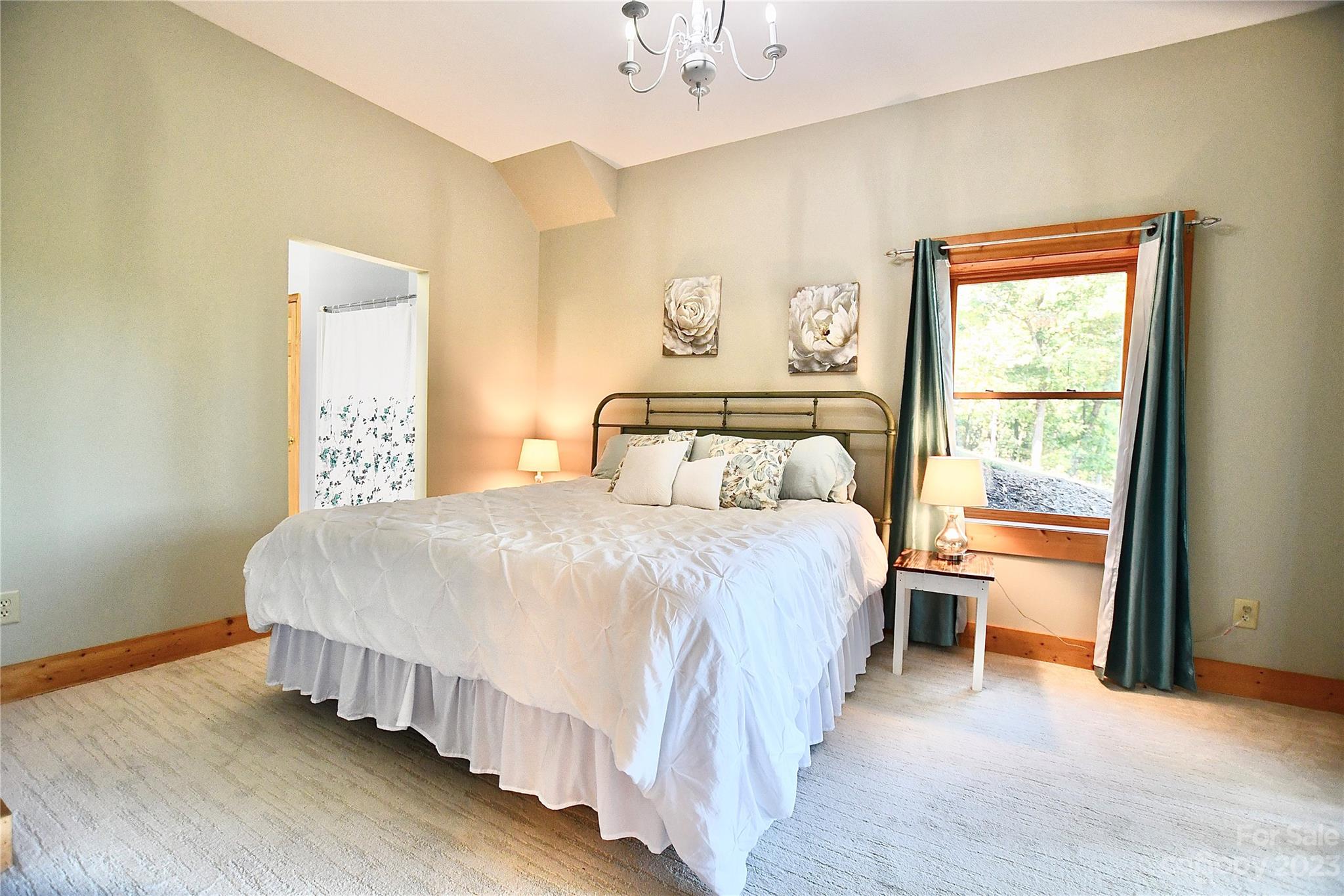 3703 Back Bluff Drive Morganton, NC 28655 - Photo 45 of 48 a bedroom with a large bed and a window