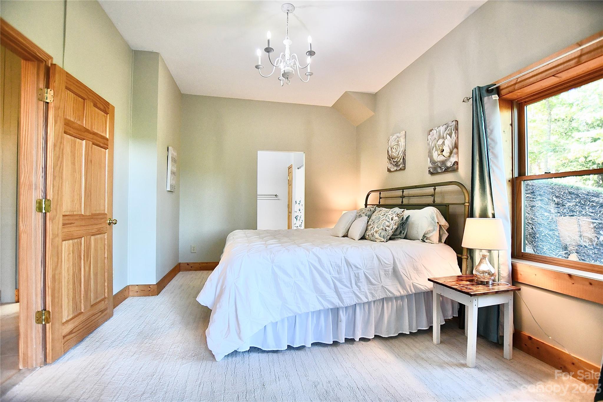 3703 Back Bluff Drive Morganton, NC 28655 - Photo 46 of 48 a bedroom with a large bed and a window