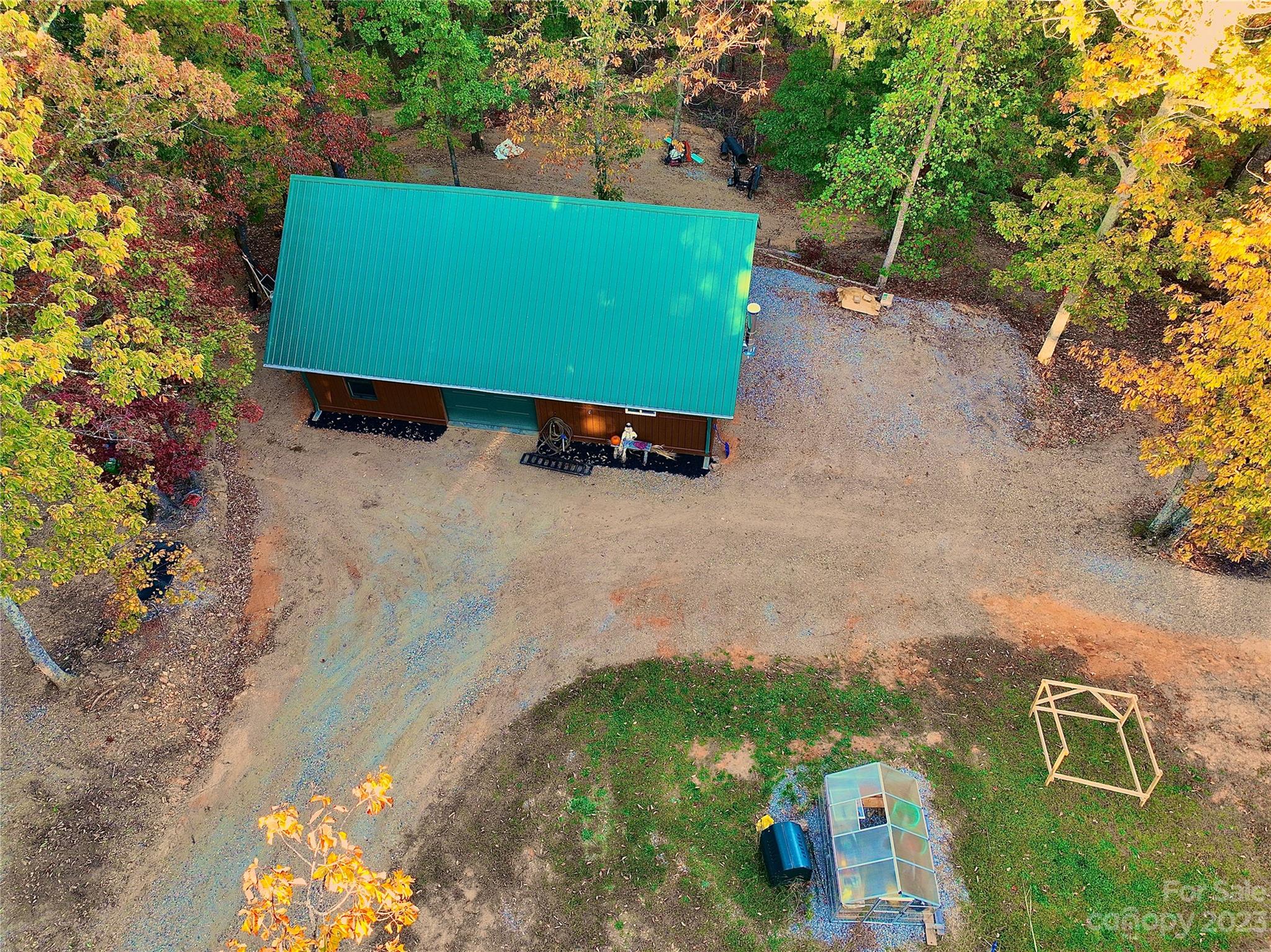3703 Back Bluff Drive Morganton, NC 28655 - Photo 7 of 48 an aerial view of a tennis ground with a yard
