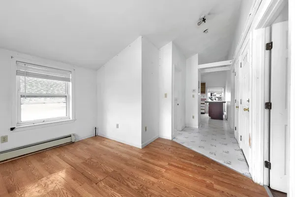 a bathroom with a sink toilet vanity and tub