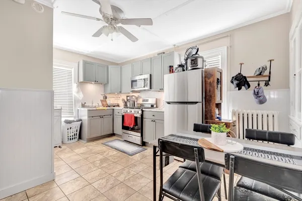 a room with furniture and flat screen tv