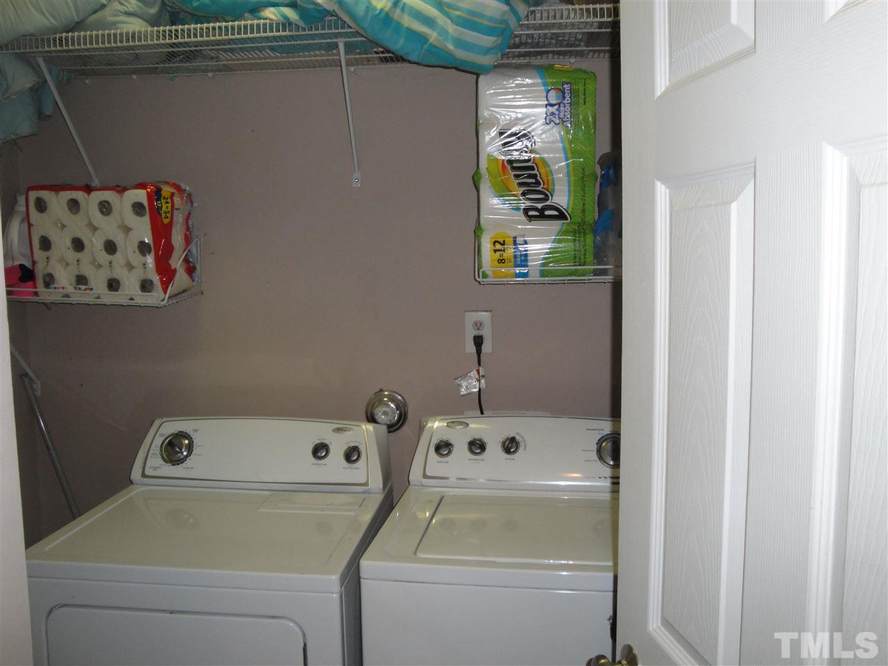 12006 Fox Valley Street Raleigh, NC 27614 - Photo 22 of 25 a utility room with dryer and washer