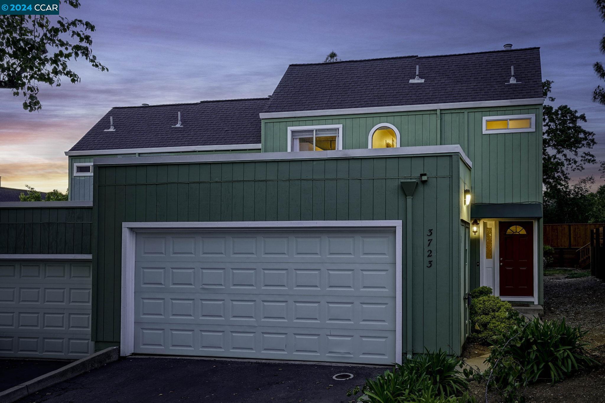 a view of a wooden door of the house