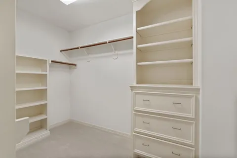 a bathroom with a sink double vanity and a mirror