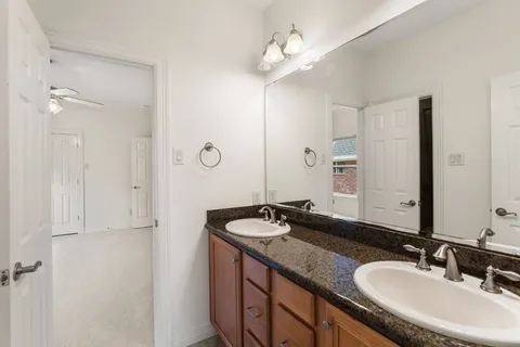 a living room with fireplace furniture and a window