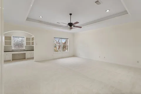 a living room with a furniture and a window