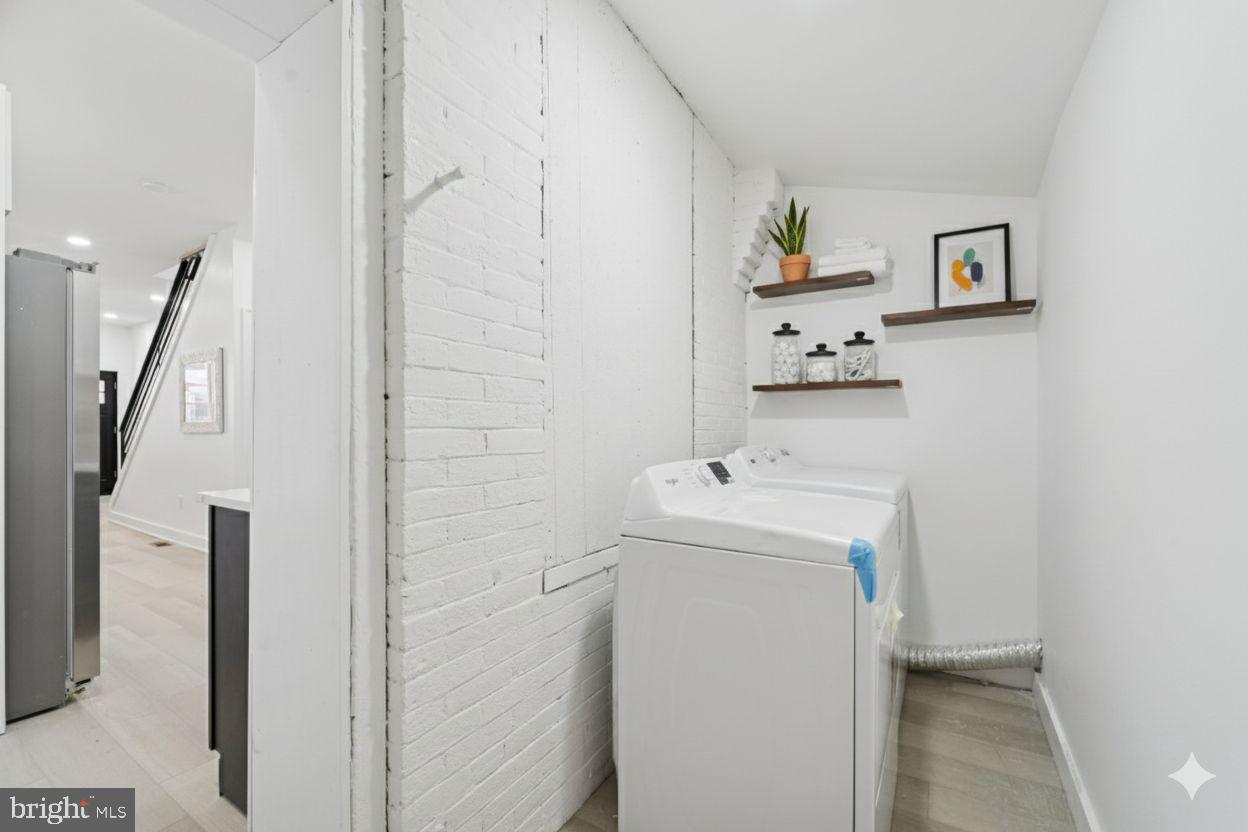 537 North Wanamaker Street Philadelphia, PA 19131 - Photo 15 of 37 a utility room with dryer and washer