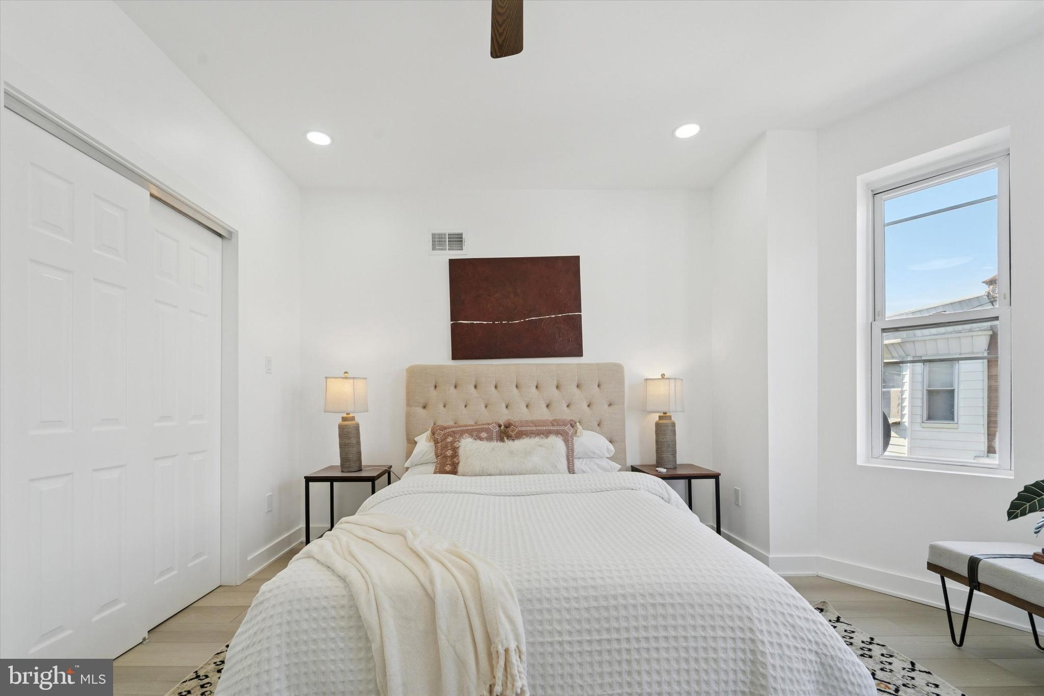 537 North Wanamaker Street Philadelphia, PA 19131 - Photo 29 of 37 a bedroom with a bed and chair