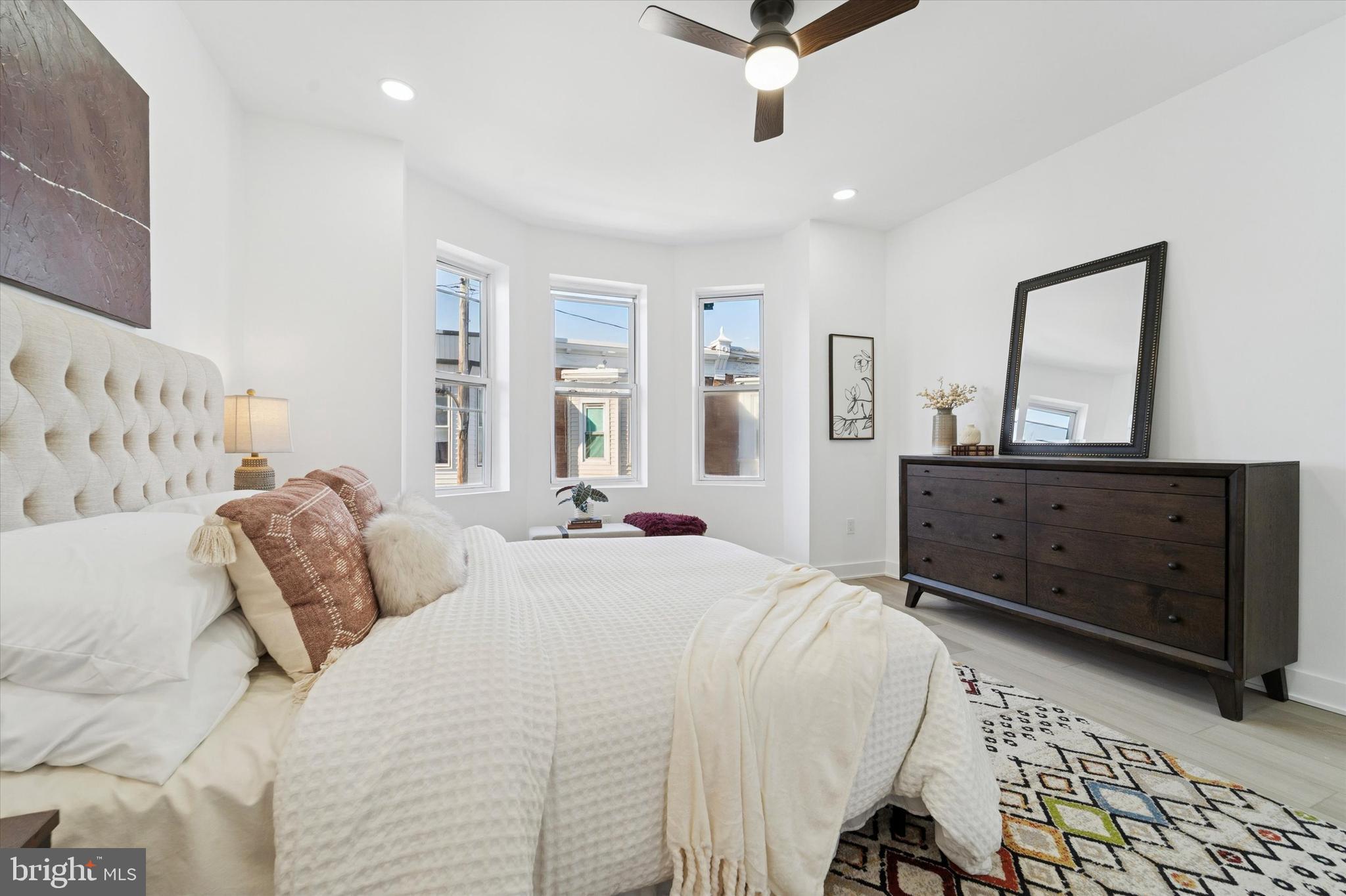 537 North Wanamaker Street Philadelphia, PA 19131 - Photo 30 of 37 a bedroom with a bed and a dresser