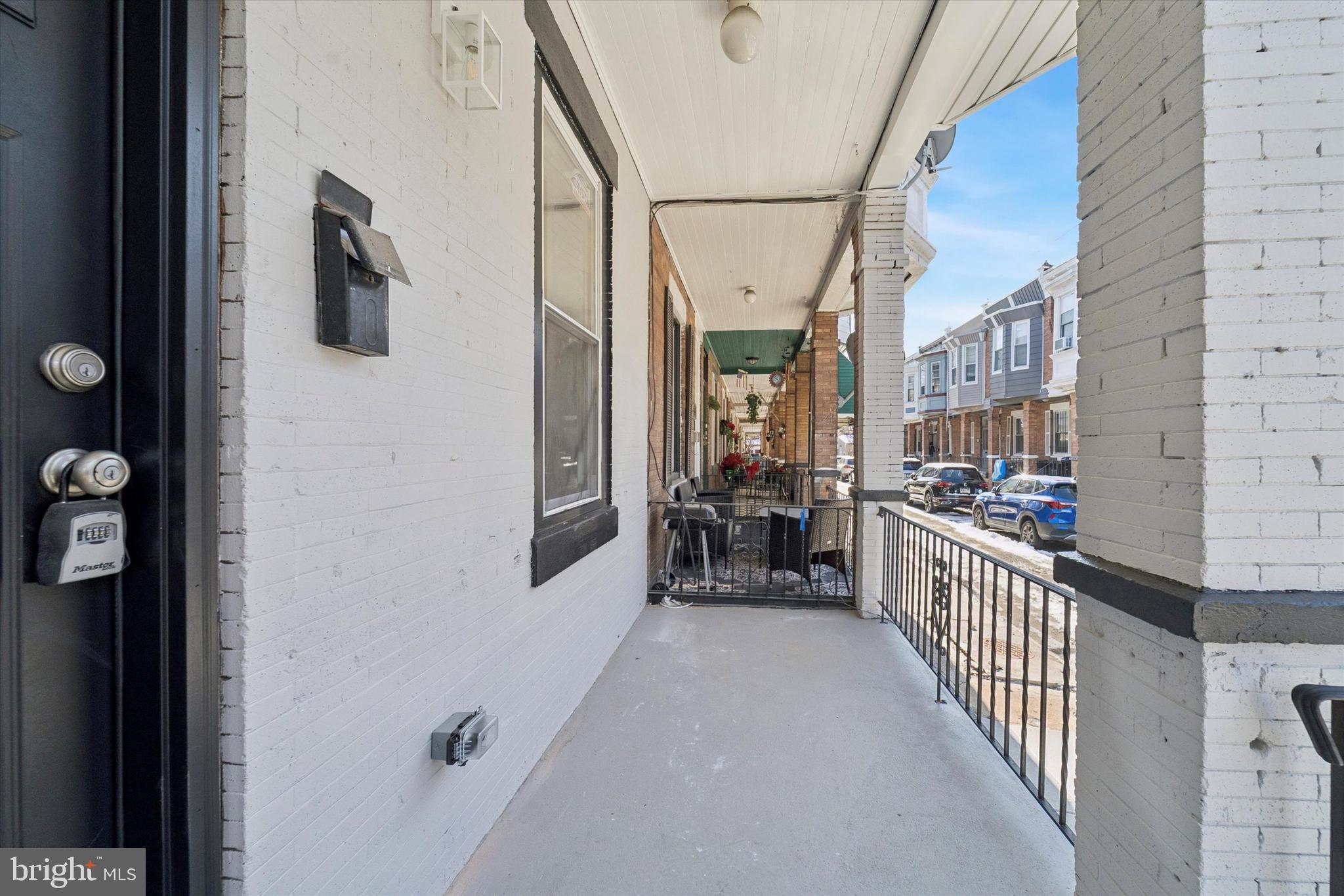 537 North Wanamaker Street Philadelphia, PA 19131 - Photo 3 of 37 a view of a porch with wooden floor and furniture