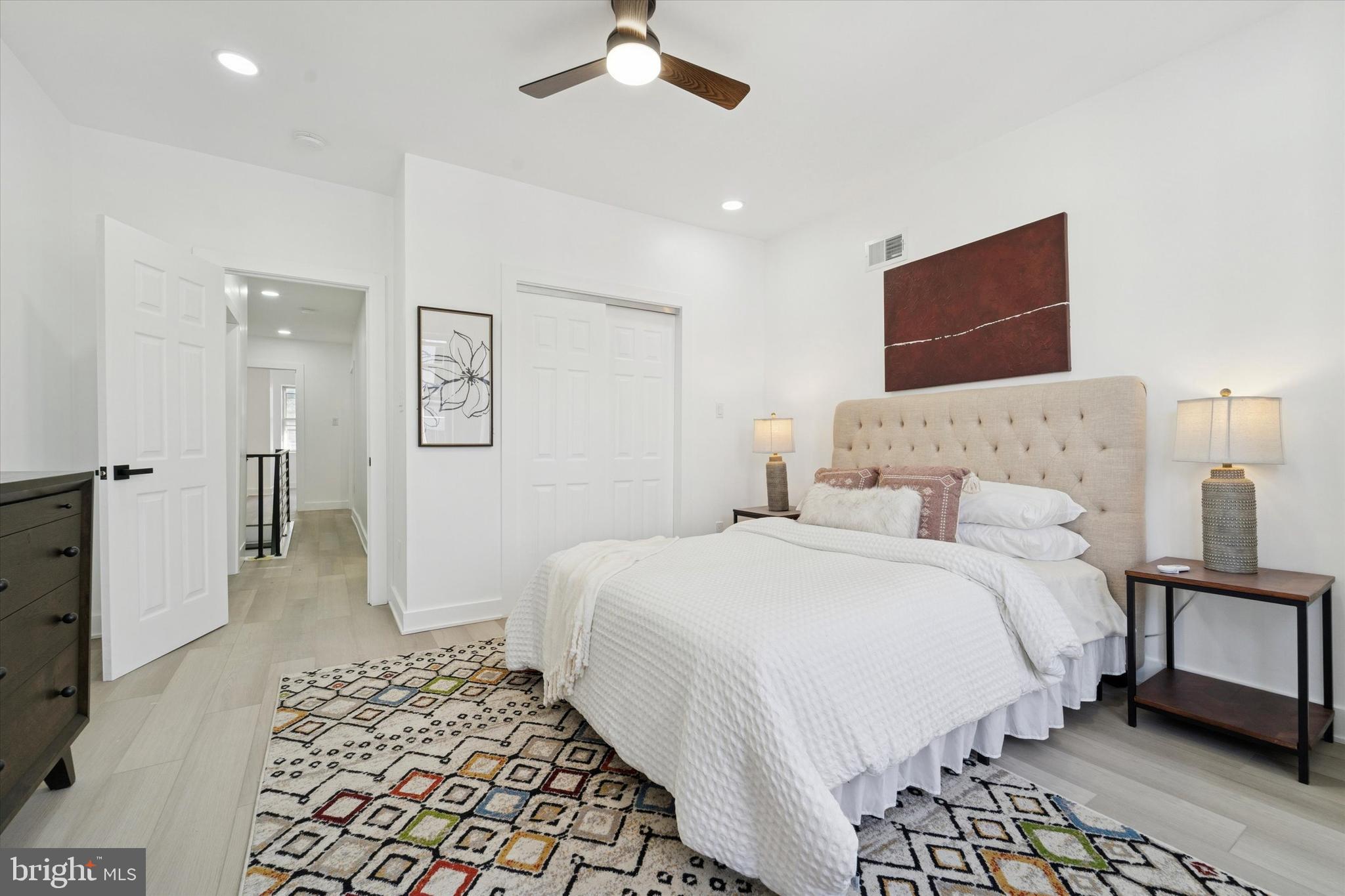 537 North Wanamaker Street Philadelphia, PA 19131 - Photo 31 of 37 a bedroom with a bed and a couch