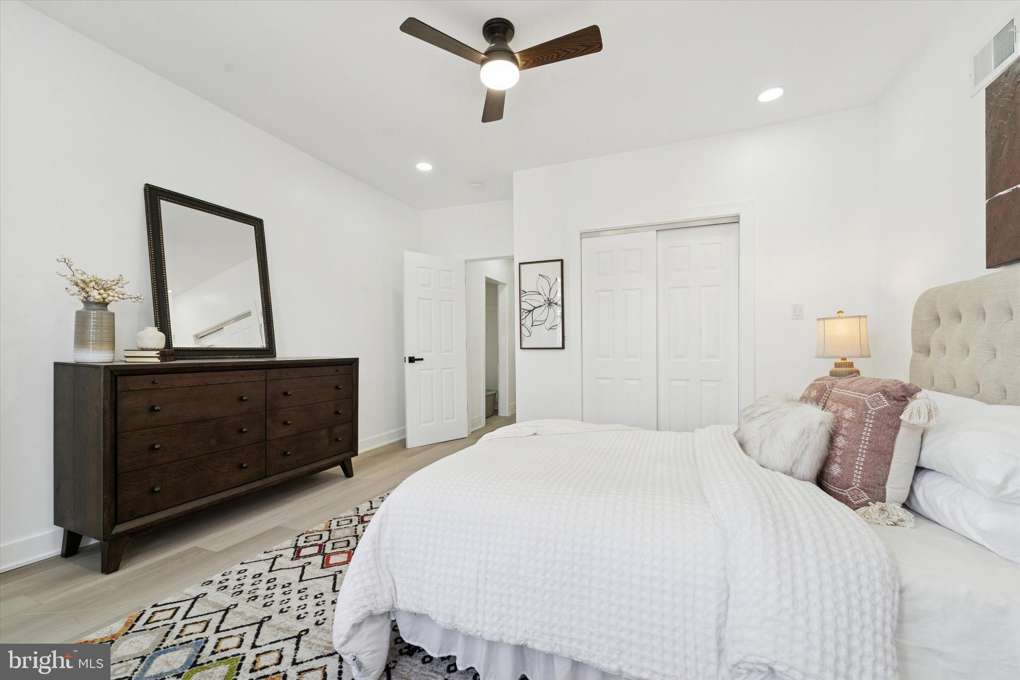537 North Wanamaker Street Philadelphia, PA 19131 - Photo 32 of 37 a bedroom with a bed and a dresser