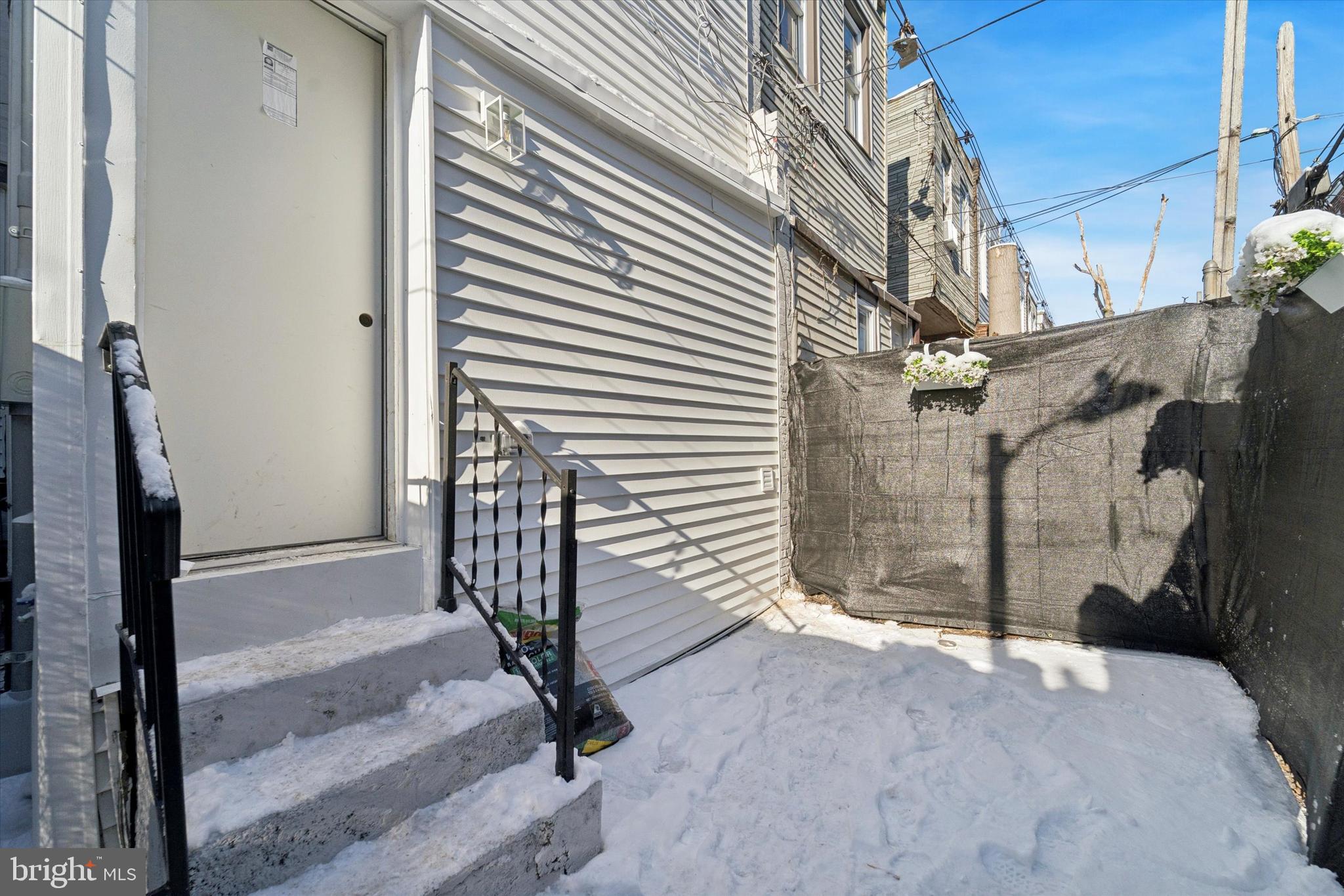 537 North Wanamaker Street Philadelphia, PA 19131 - Photo 33 of 37 a view of a house with a door and a outdoor space