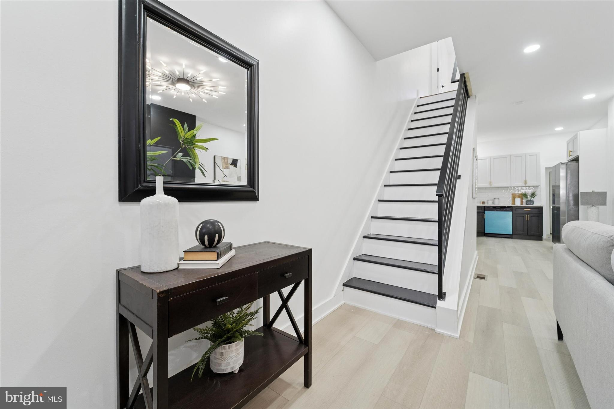 537 North Wanamaker Street Philadelphia, PA 19131 - Photo 4 of 37 a view of dining room and stairs