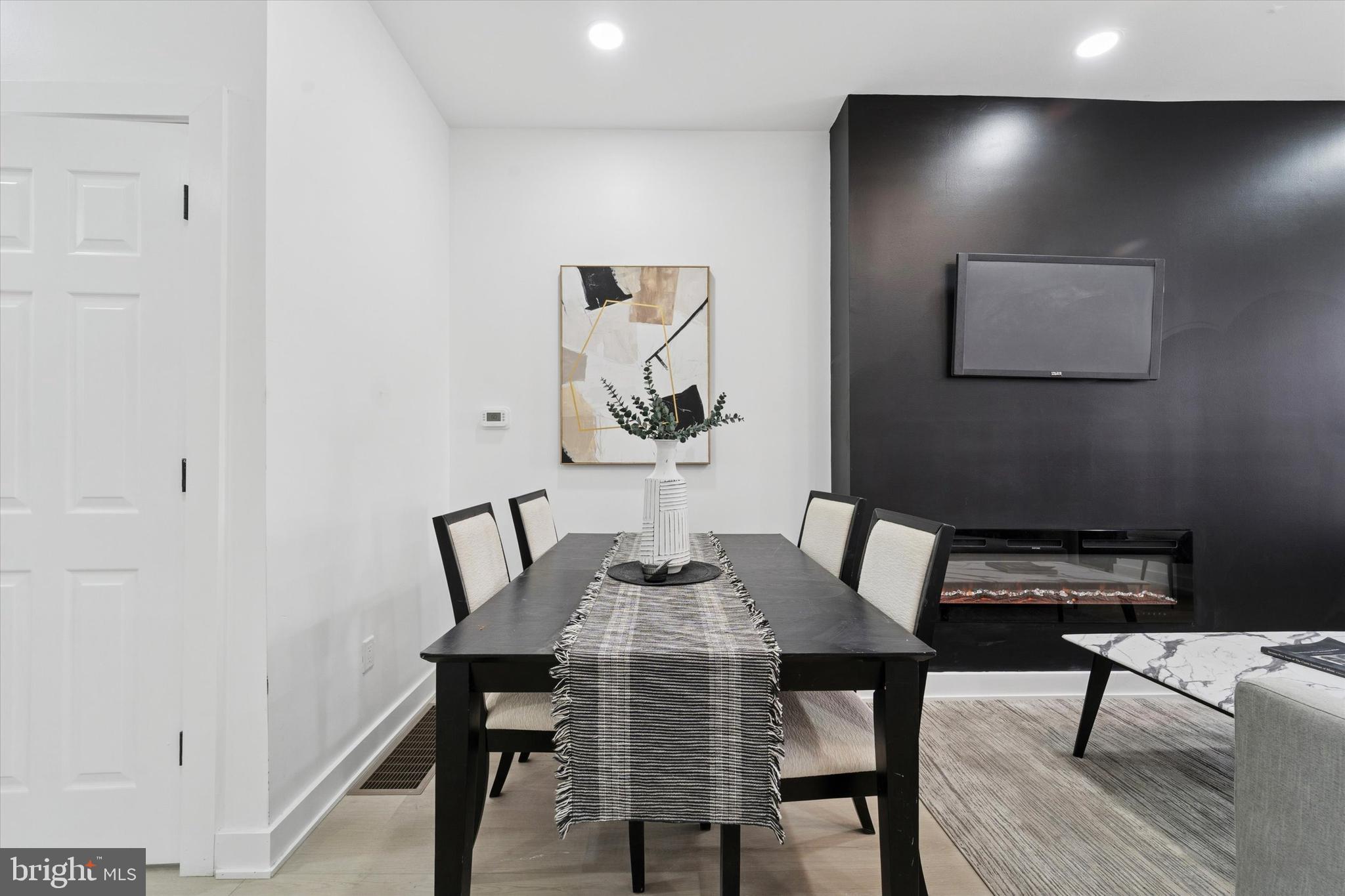 537 North Wanamaker Street Philadelphia, PA 19131 - Photo 7 of 37 a view of a dining room with furniture and wooden floor