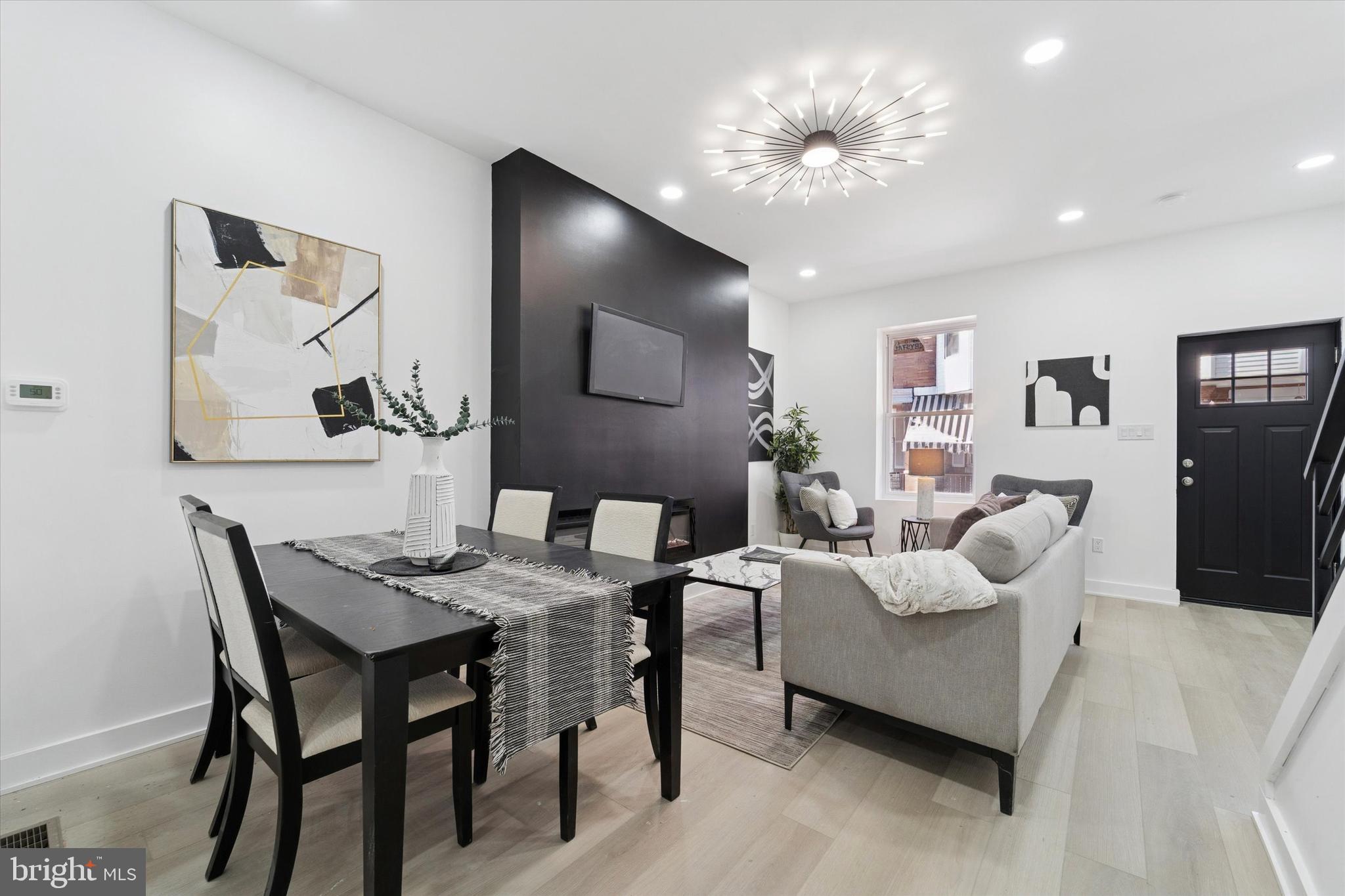 537 North Wanamaker Street Philadelphia, PA 19131 - Photo 9 of 37 a view of a livingroom with furniture and a potted plant