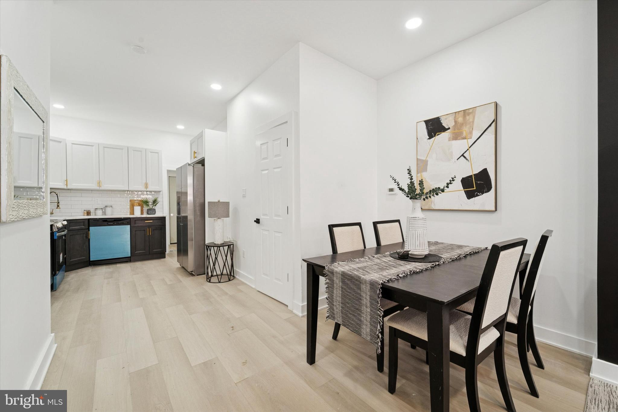 537 North Wanamaker Street Philadelphia, PA 19131 - Photo 10 of 37 a view of kitchen with cabinets and wooden floor