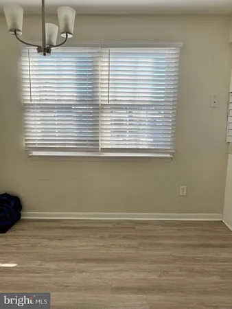 a view of a room that has a window