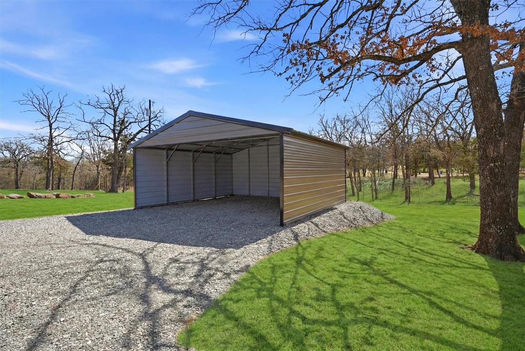 230 Frosty Hollow Road Denison, TX 75021 - Photo 3 of 40 New 2 car corport Just added its a bonus