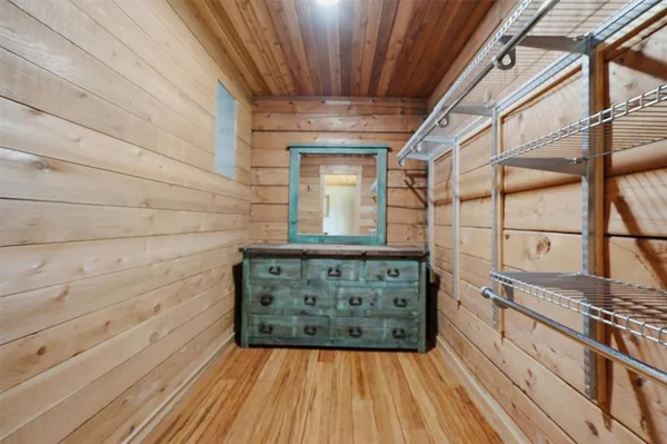 a en suite bathroom with a sink a mirror and a bathtub