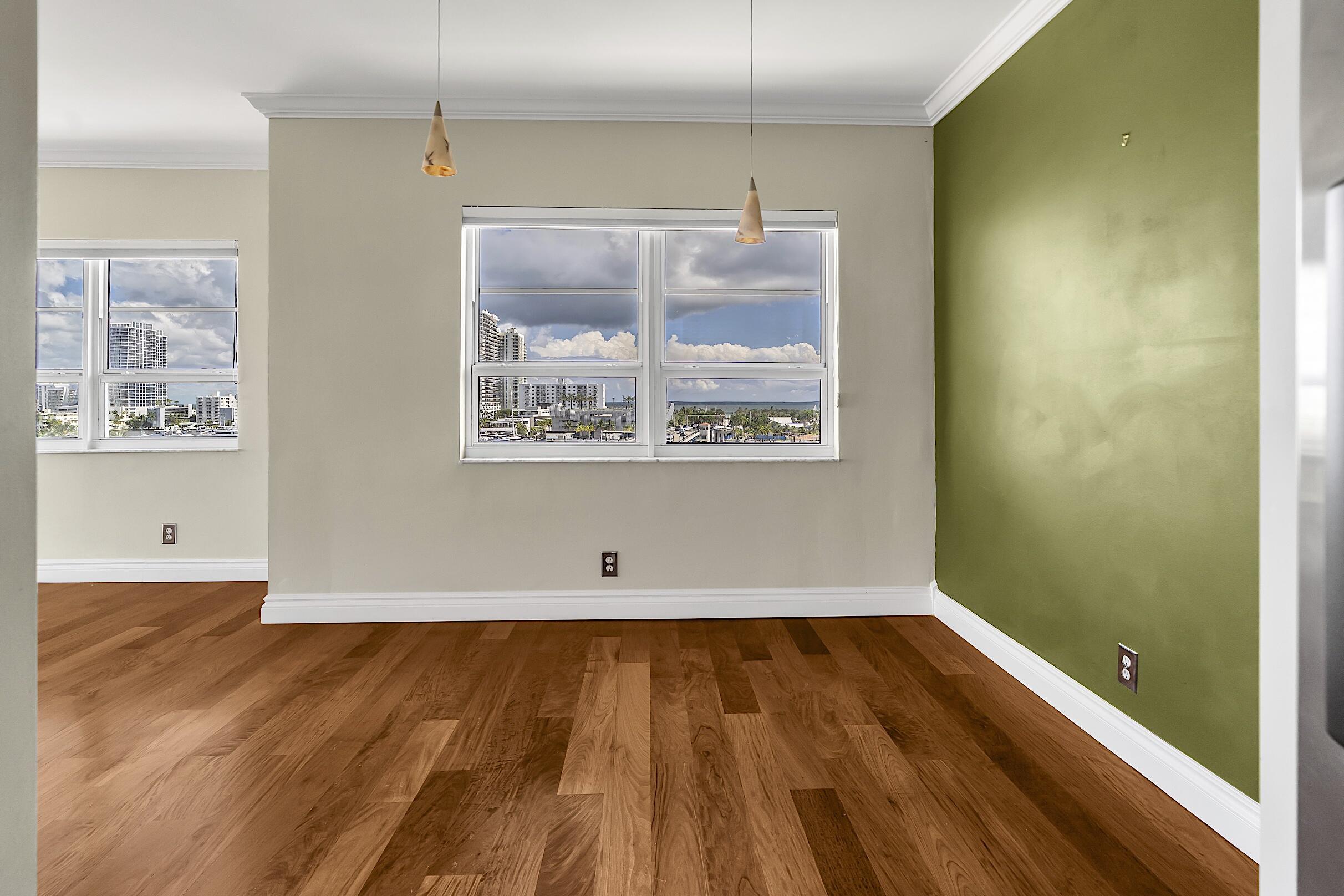 2500 East Las Olas Boulevard, Unit 802 Fort Lauderdale, FL 33301 - Photo 27 of 67 a view of a room with wooden floor and a window