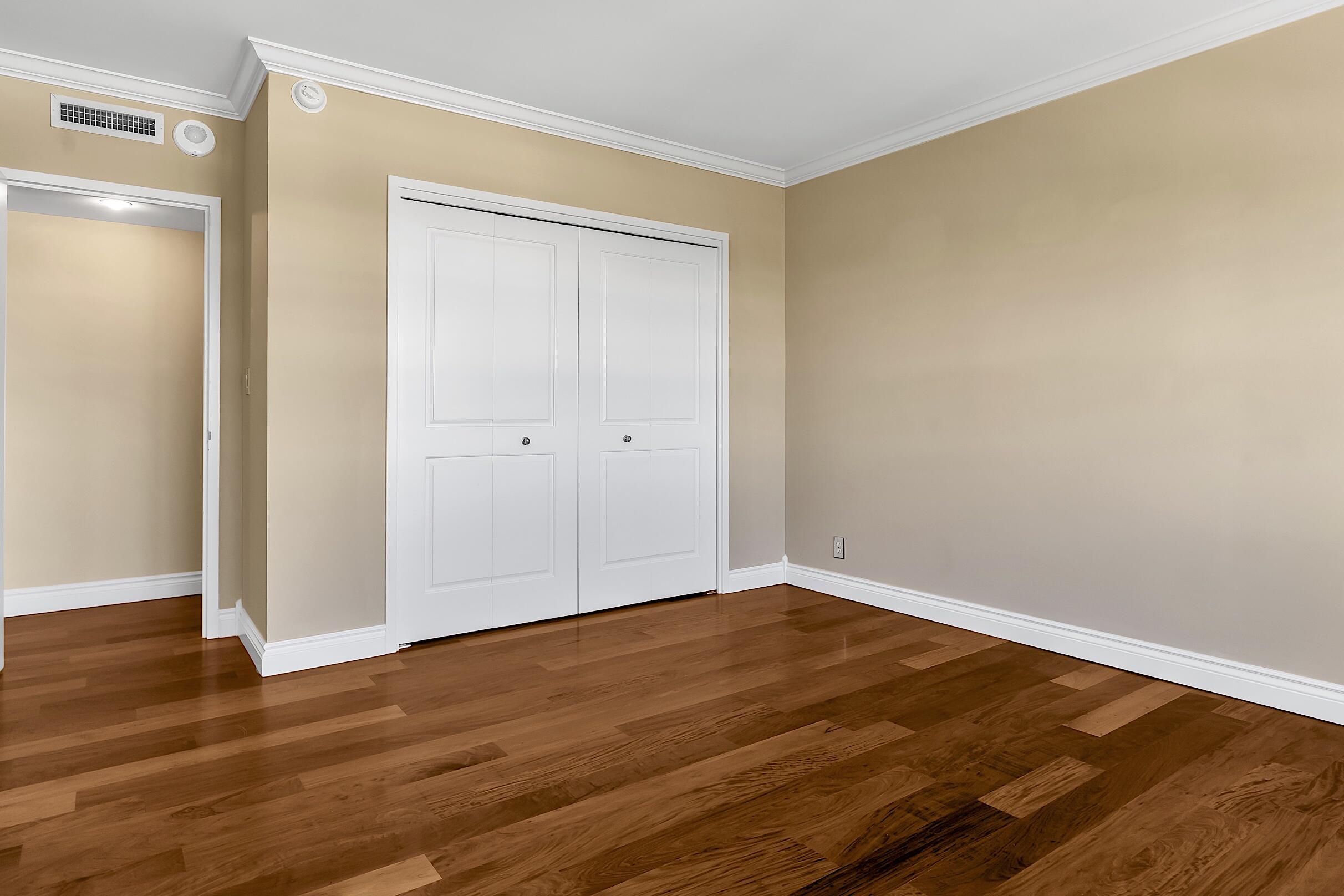 2500 East Las Olas Boulevard, Unit 802 Fort Lauderdale, FL 33301 - Photo 35 of 67 a view of an empty room with wooden floor and a window