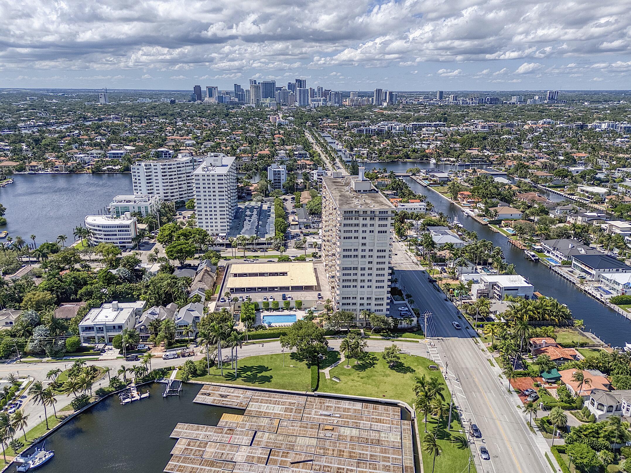 2500 East Las Olas Boulevard, Unit 802 Fort Lauderdale, FL 33301 - Photo 64 of 67 an aerial view of a city with lots of residential buildings ocean and mountain view in back