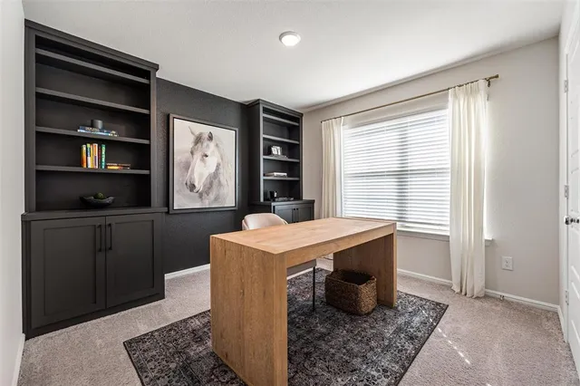 a bathroom with a sink a toilet and shower curtain