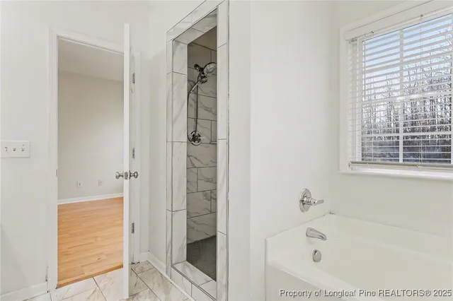 a bathroom with a bathtub