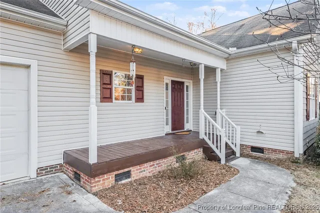 a front view of a house with stairs