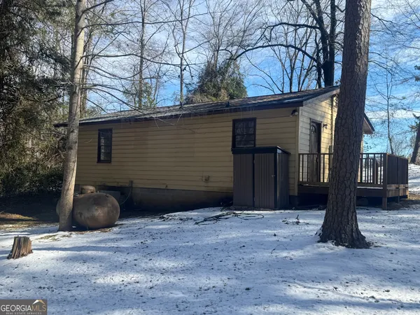 a view of a house and a yard