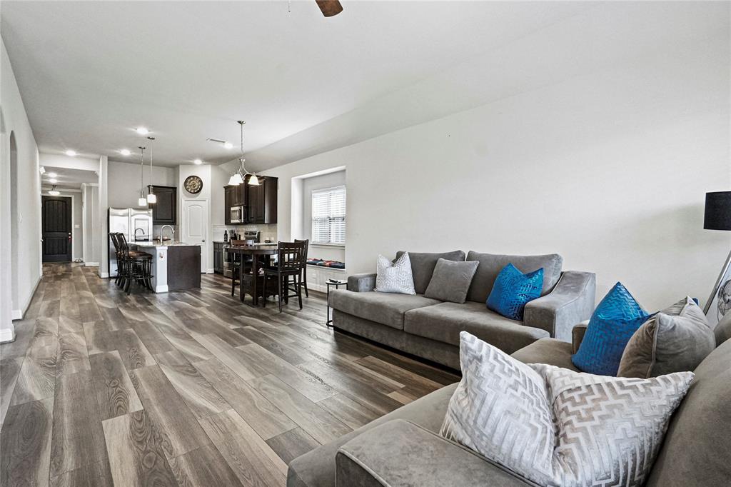 105 Melody Way Red Oak, TX 75154 - Photo 15 of 27 a living room with furniture and kitchen view