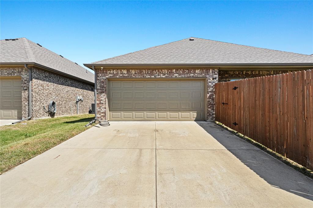 105 Melody Way Red Oak, TX 75154 - Photo 27 of 27 a front view of a house with garage
