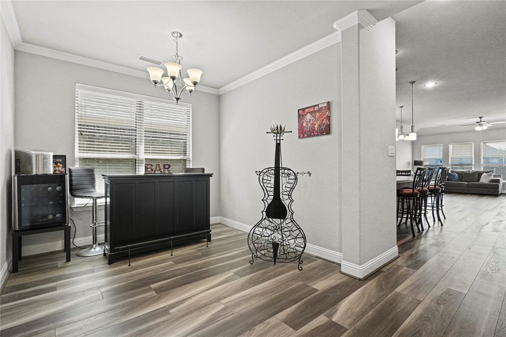 105 Melody Way Red Oak, TX 75154 - Photo 5 of 27 a view of a room with furniture and a chandelier