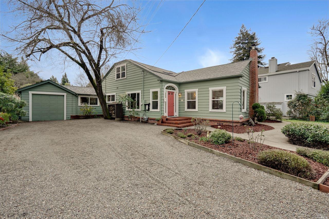 2030 Siesta Lane Santa Rosa, CA 95404 - Photo 1 of 1 a front view of a house with a yard and garage