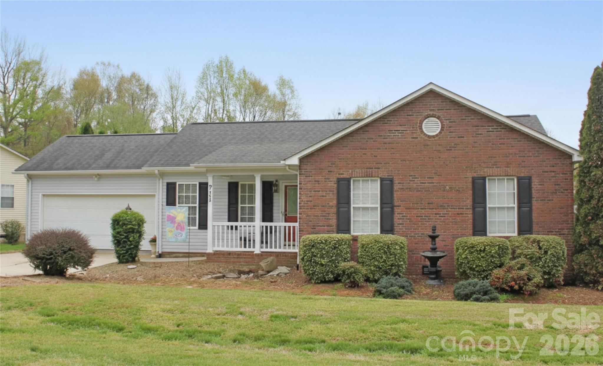 711 Braemore Court Northwest Conover, NC 28613 - Photo 1 of 25 a front view of a house with garden