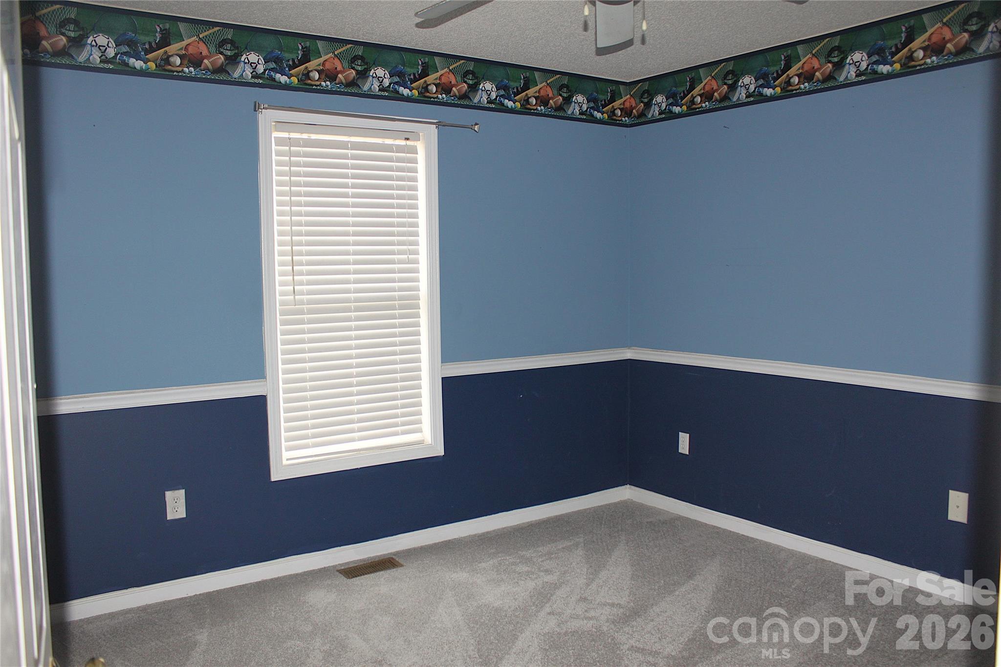711 Braemore Court Northwest Conover, NC 28613 - Photo 18 of 25 a view of a chandelier fan and window
