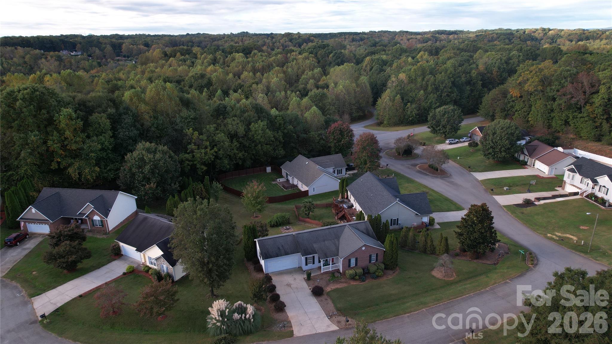 711 Braemore Court Northwest Conover, NC 28613 - Photo 21 of 25 an aerial view of a house with lots of trees