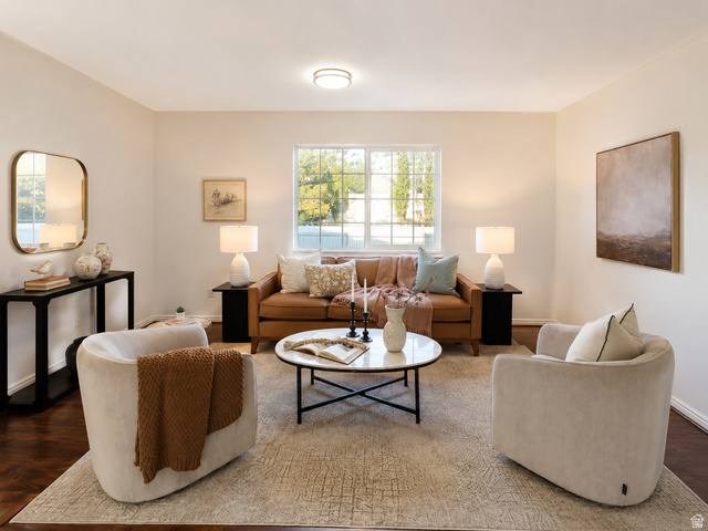 30 West 7500th Street South, Unit 18 Midvale, UT 84047 - Photo 5 of 14 Bright living area featuring wood-finish flooring, a contemporary window with multiple panes, and light-toned wall finishes
