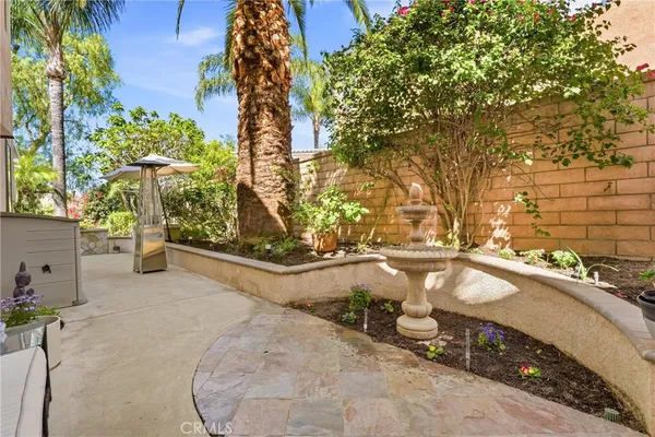 a view of a swimming pool with a yard