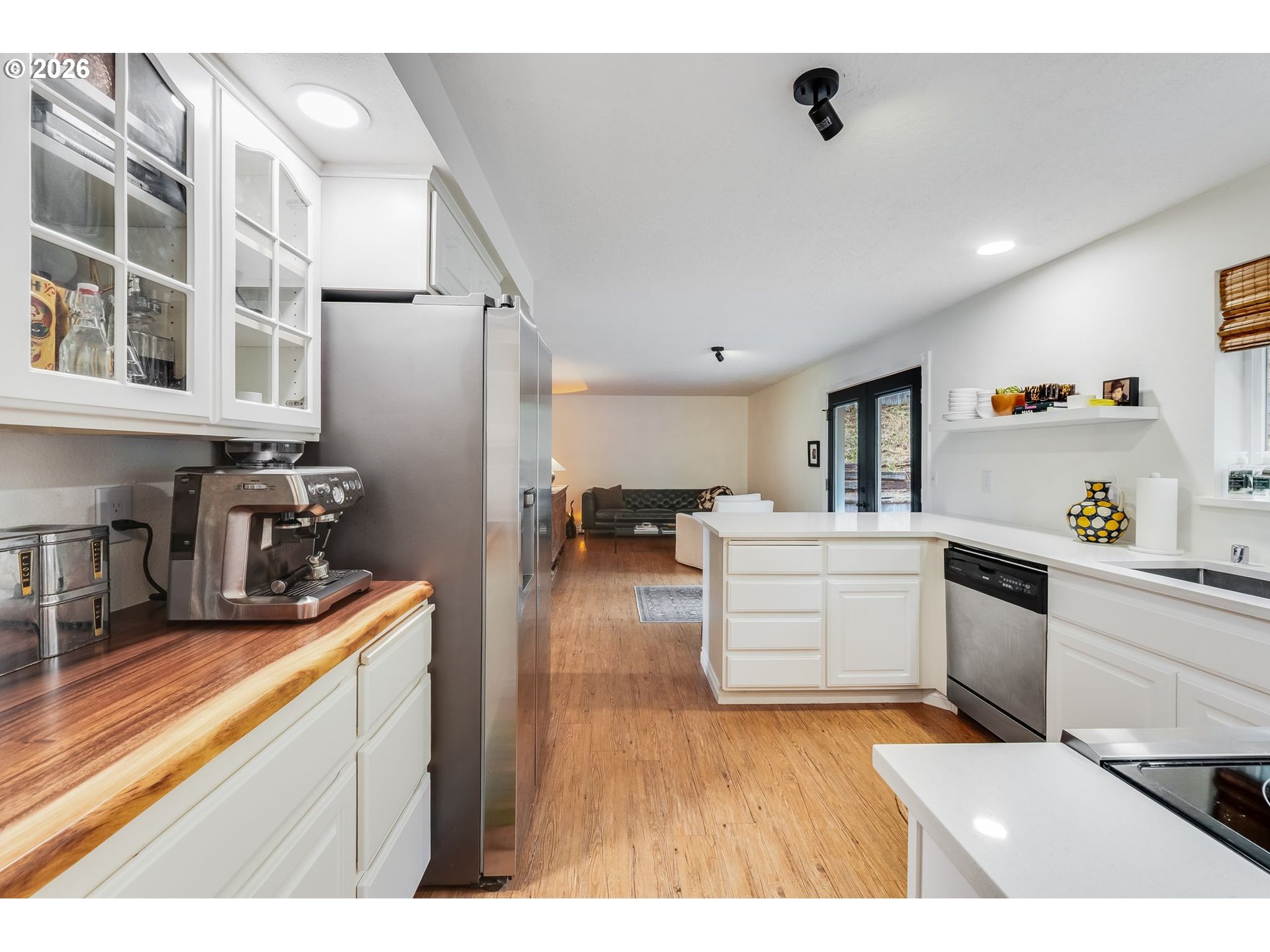506 Haussler Road Kelso, WA 98626 - Photo 12 of 36 a kitchen with a refrigerator and a sink