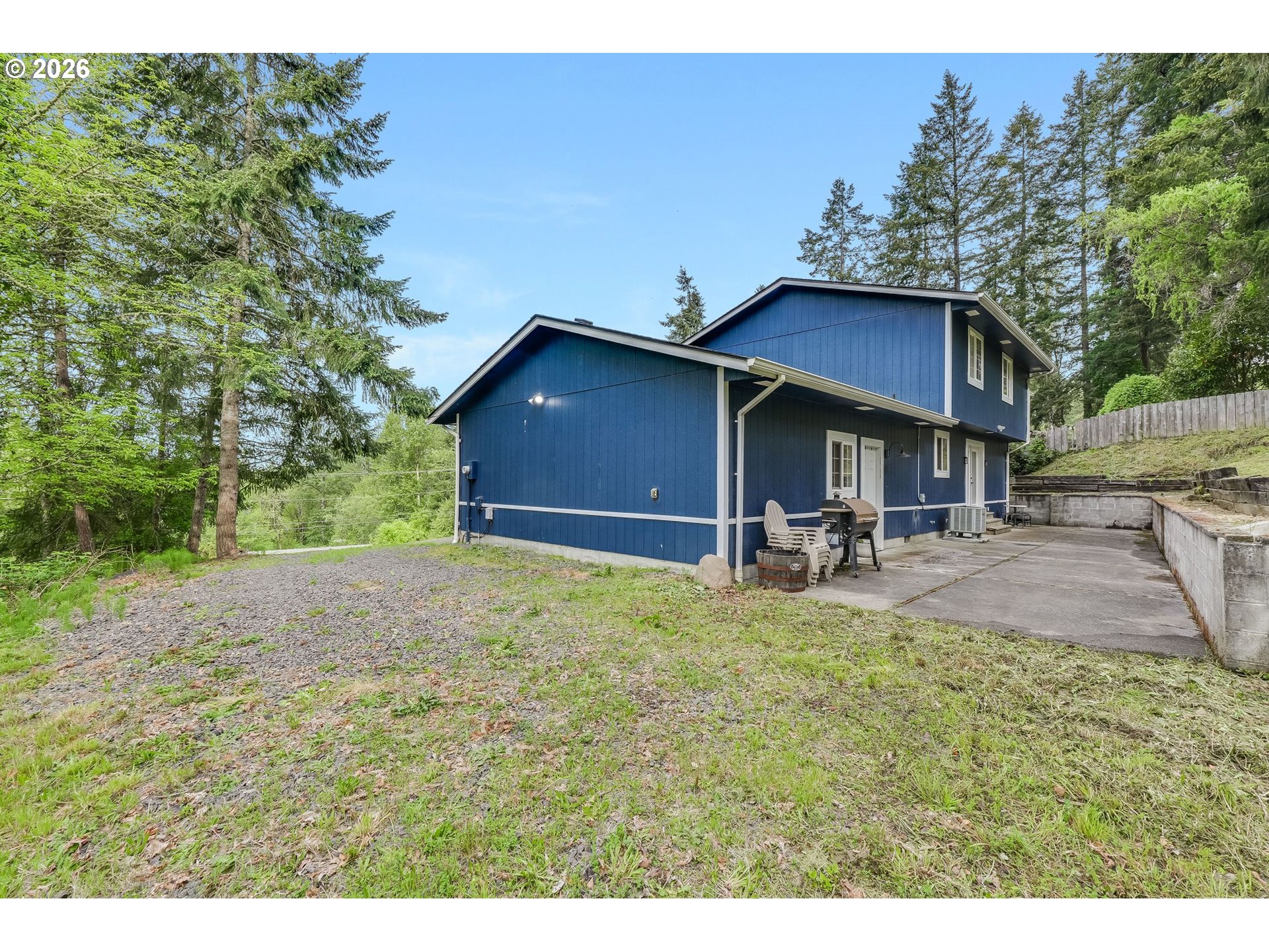 506 Haussler Road Kelso, WA 98626 - Photo 29 of 36 a view of a house with a yard