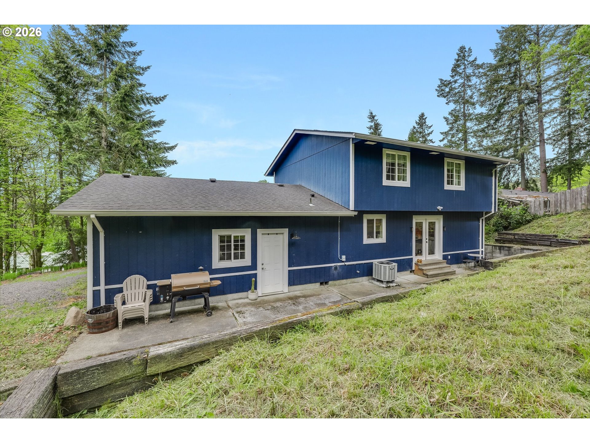 506 Haussler Road Kelso, WA 98626 - Photo 32 of 36 a view of a yard with a table and chairs