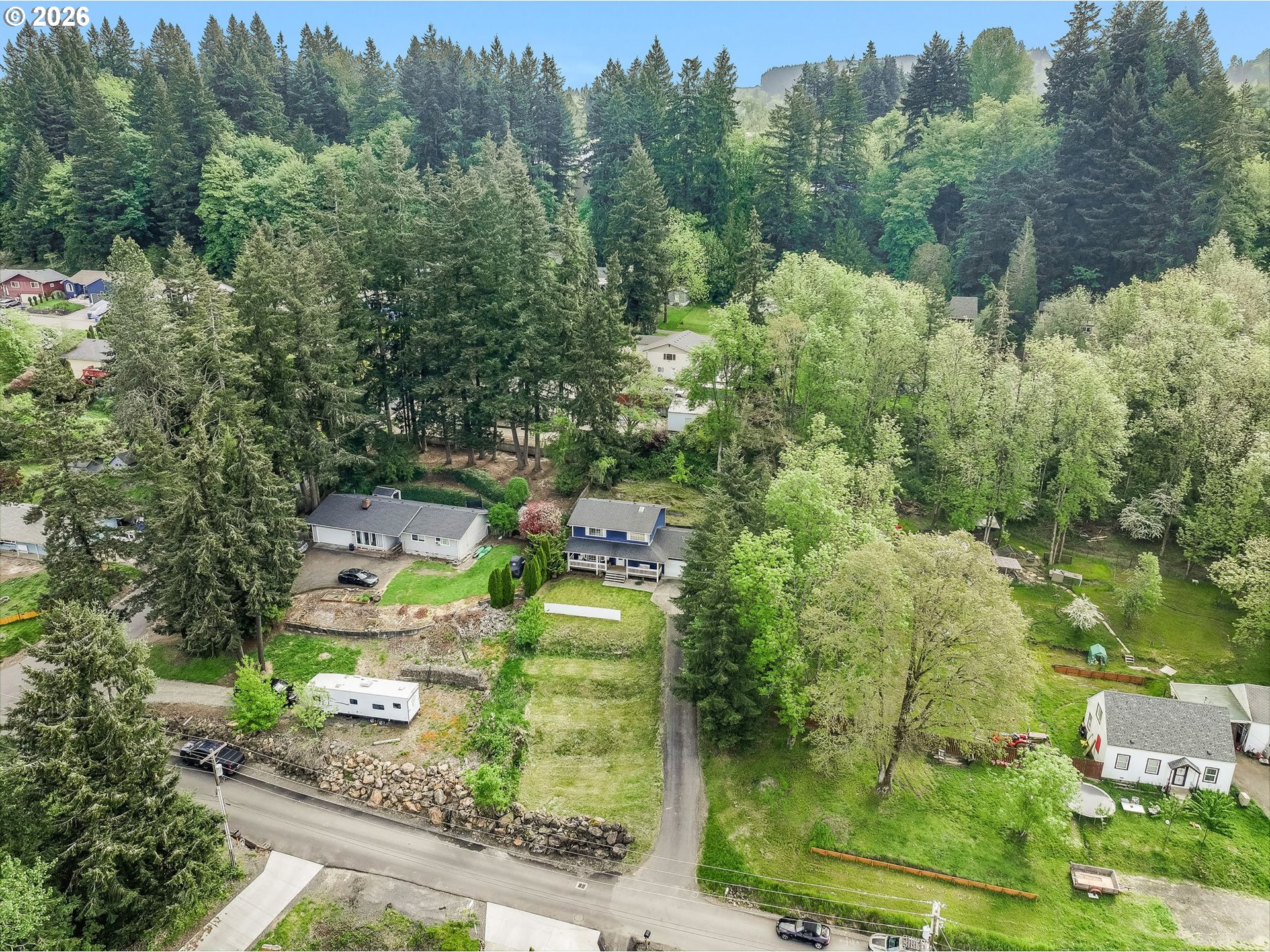 506 Haussler Road Kelso, WA 98626 - Photo 35 of 36 an aerial view of residential houses with outdoor space and trees