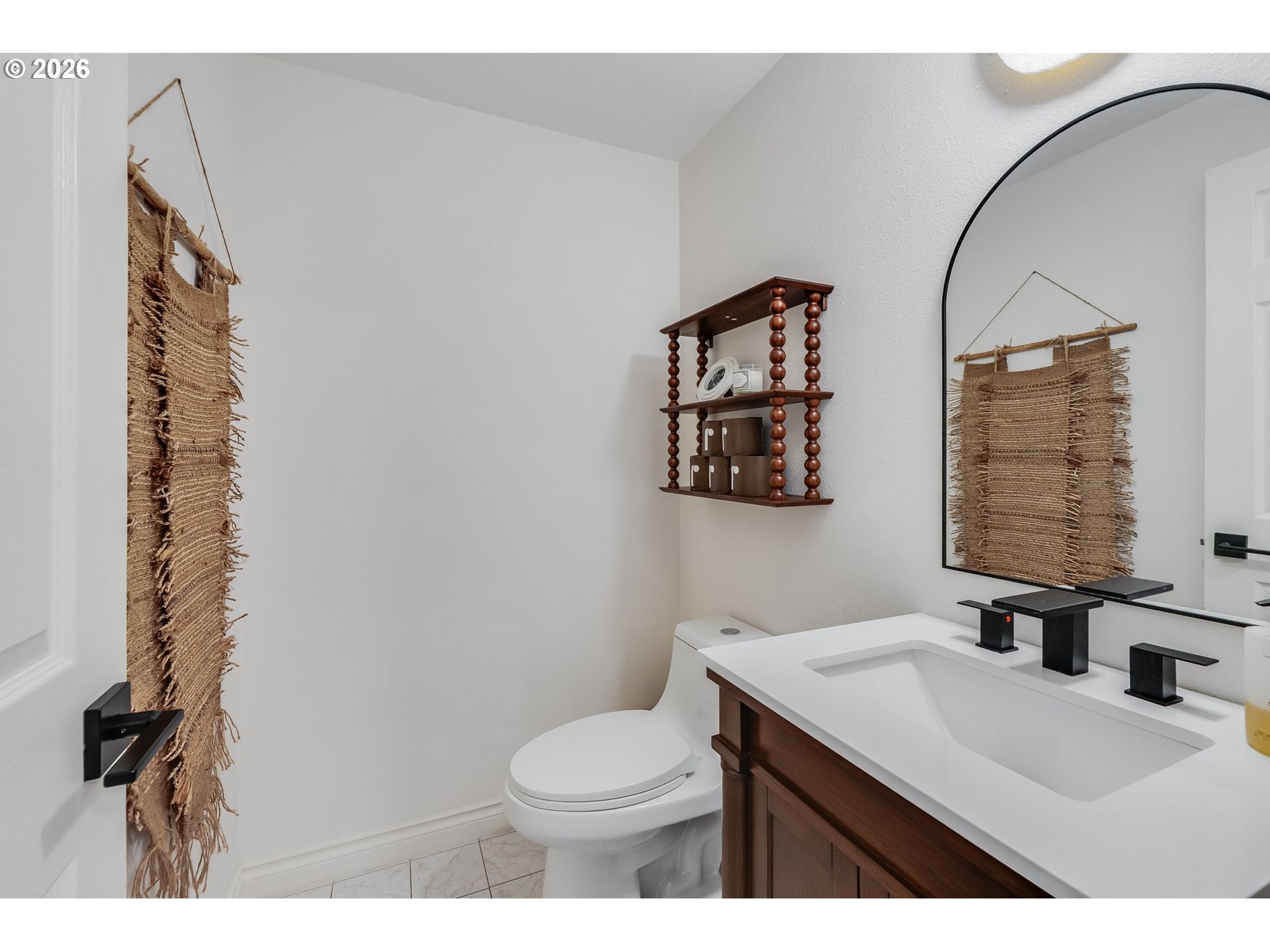 506 Haussler Road Kelso, WA 98626 - Photo 6 of 36 a bathroom with a sink vanity mirror and toilet
