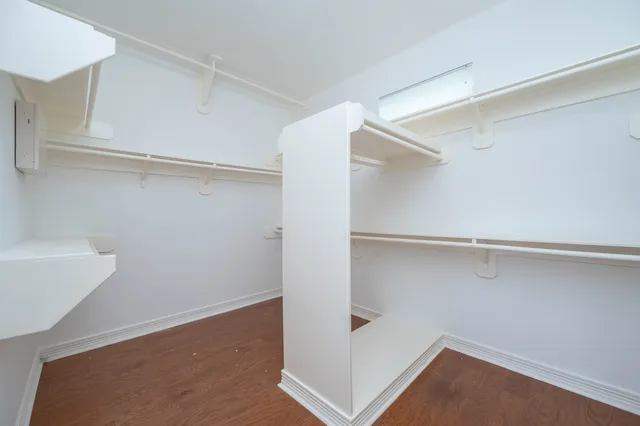 a view of an empty walk in closet