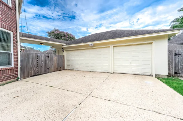 a front view of a house with a garage