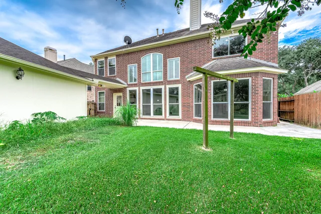 a house view with a garden space