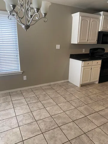 a view of a kitchen cabinets